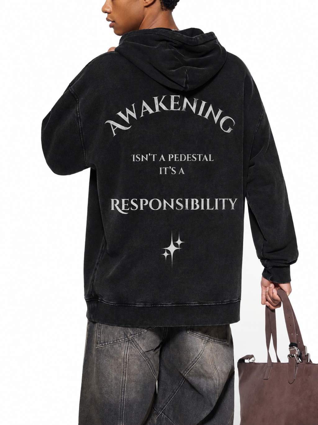 Awakening Isn't a Pedestal black washed oversized hoodie back with responsibility statement graphic