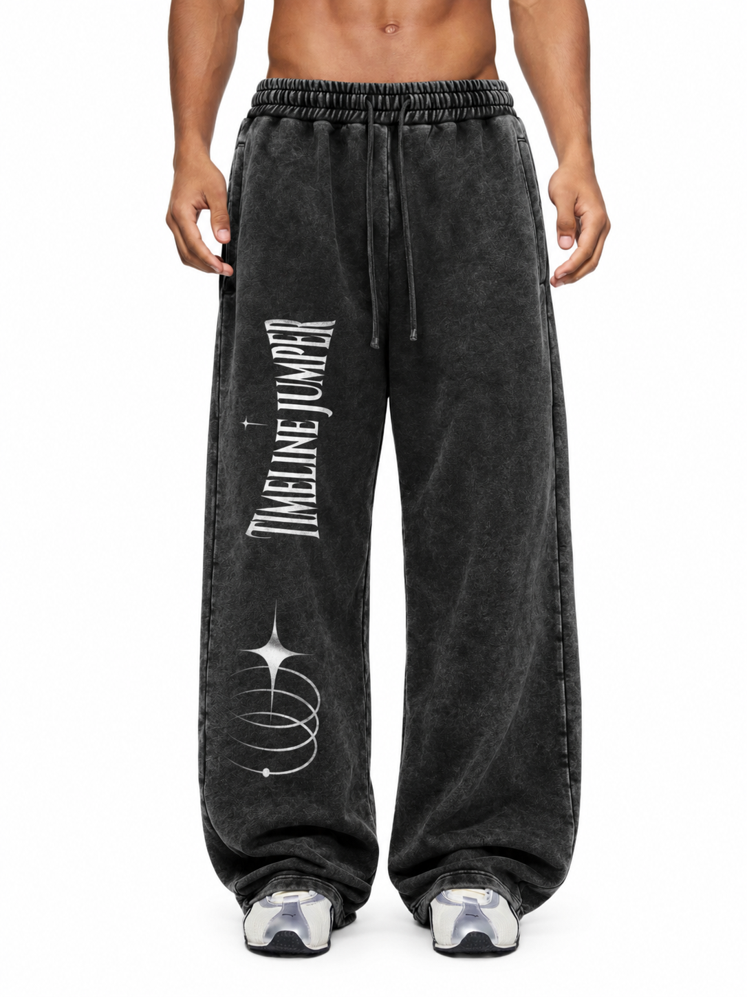 Model wearing Timeline Jumper black snow wash sweatpants with white artwork on the right leg