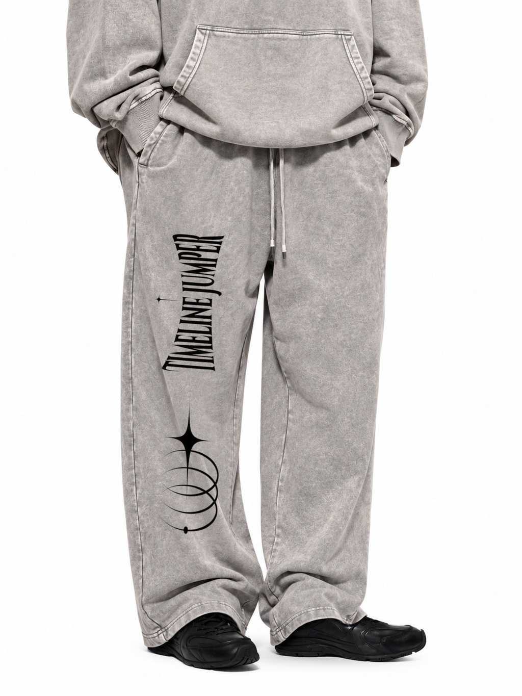 Lifestyle view of Timeline Jumper light gray heavyweight sweatpants with right-leg celestial print