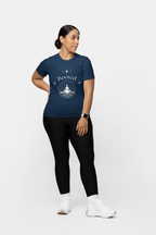Person wearing a navy blue t-shirt with 'Rooted' design on a white background